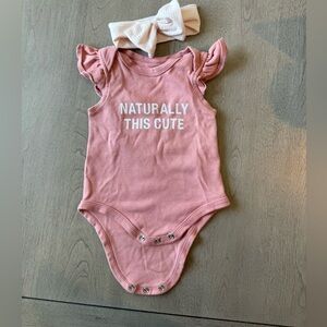 Naturally this cute onsie with hair band
